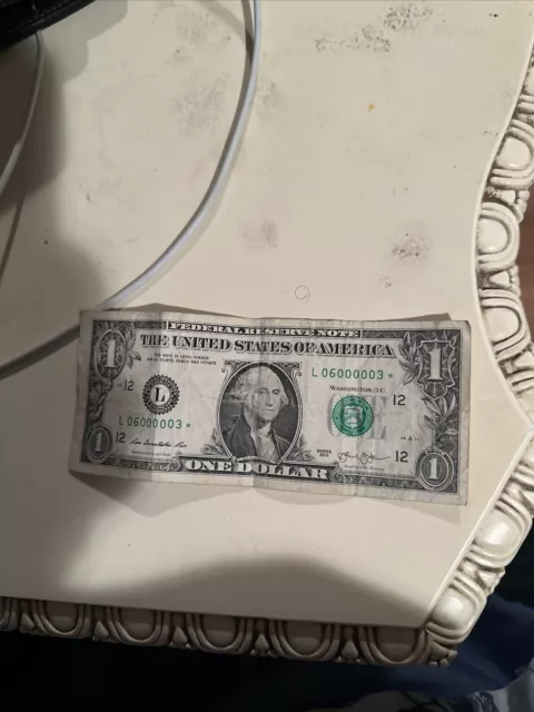 billete de 1 dolar con estrella