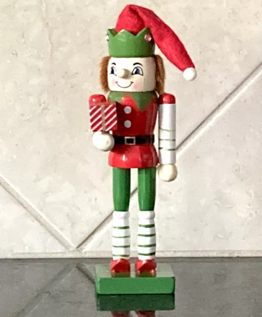 Elf holding Present Nutcracker Collectible Christmas Decor