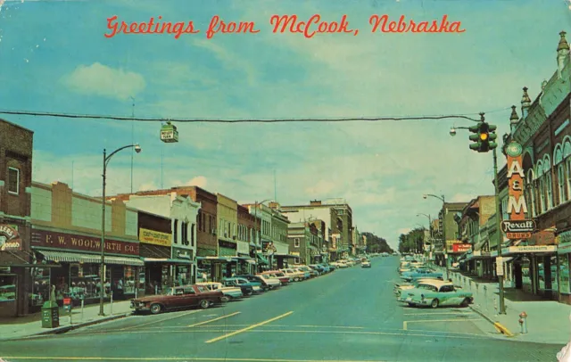 Postcard McCook, Nebraska: Greetings, Main Street View, F.W. Woolworth's, Cars