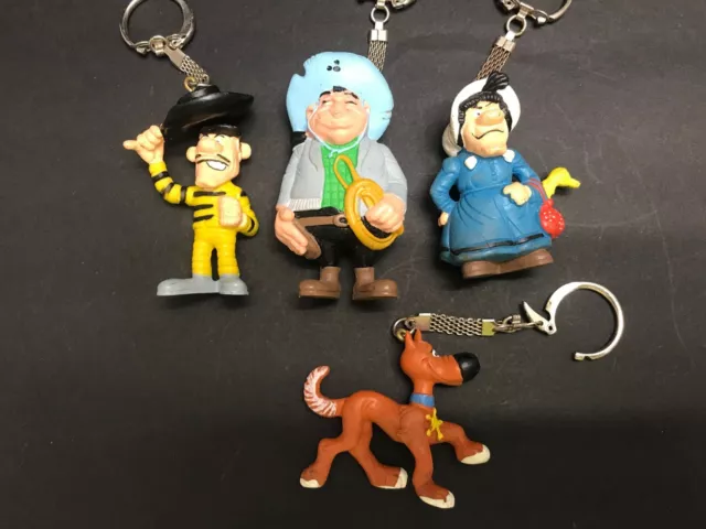 4 FIGURINES ANCIENNES PVC LUCKY LUKE en porte clef