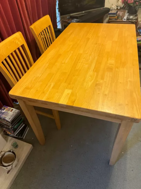 solid wood table and 4 chairs