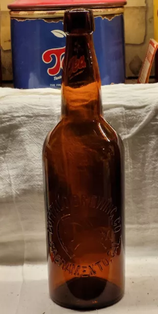 BUFFALO BREWING CO SACRAMENTO CALIFORNIA BLOB TOP AMBER QUART w EMBOSSED BUFFALO
