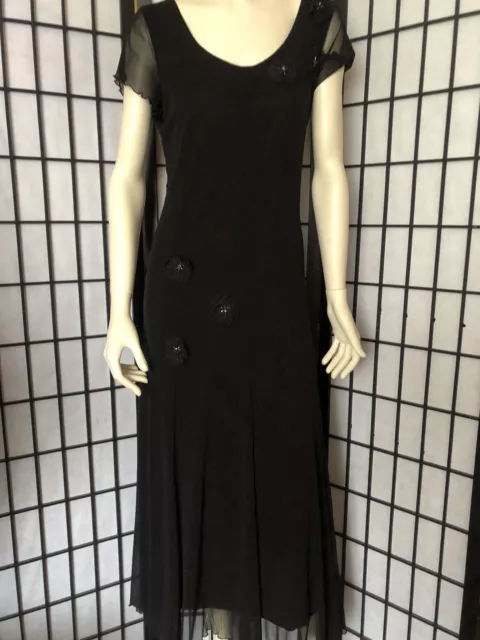 Nightingale’s Size 14 Black Maxi Dress. Chiffon with handkerchief hemline.