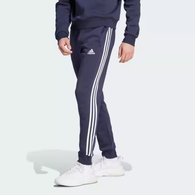 Pantaloni Pantalone Tuta Adidas Essentials Fleece 3-Stripes Tapered Cuff Uomo