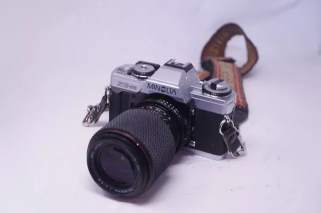 Vintage Japanese Minolta XGM SLR Film Camera with Tokina 70-210mm zoom lens