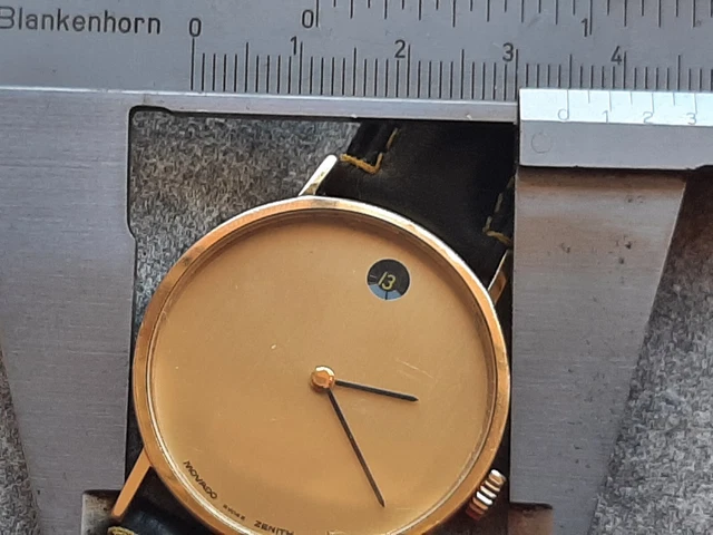 ZENITH-MOVADO MUSEUM 20.0040.366 QUADRANTE DORATO; MANUALE Zenith 2572. 35 mm.  11