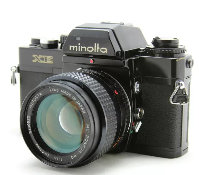 Minolta XE black, vintage analog SLR camera & lens MC Rokkor PG 1:1,4  f= 50mm