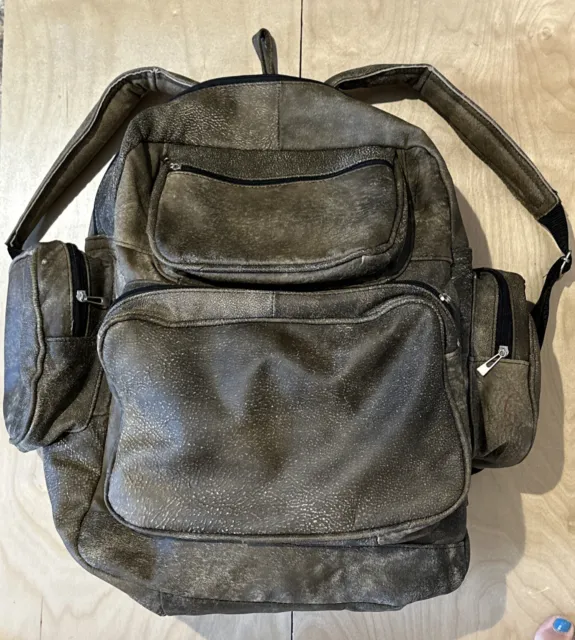 Genuine leather backpack large.  With Pockets.