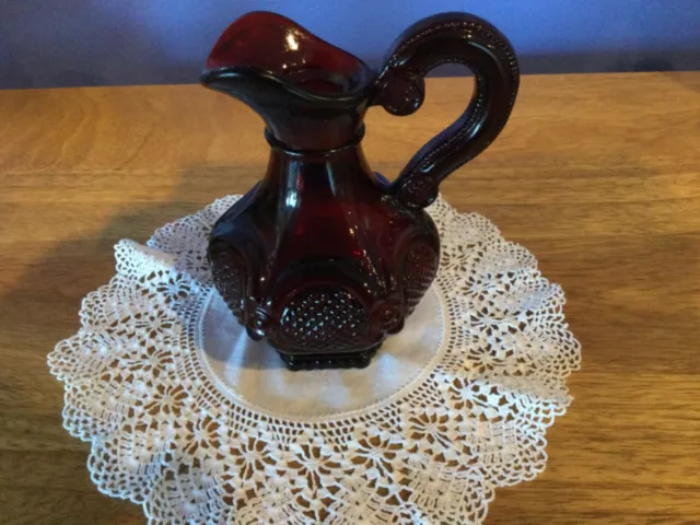 Vintage Ruby Red Avon collectible glass decanter or jug retired 1970-90's
