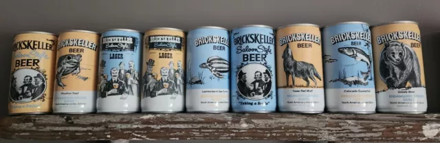 9 Different Brickskeller Beer Cans Endangered Species Series.  Bottom opened.