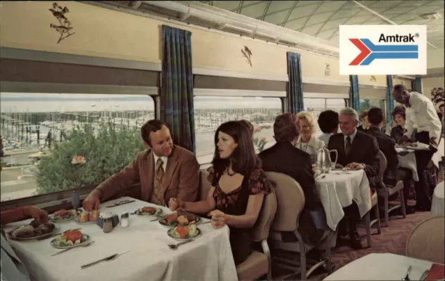 Amtrak train passenger dining car full course meals waiter advertising postcard