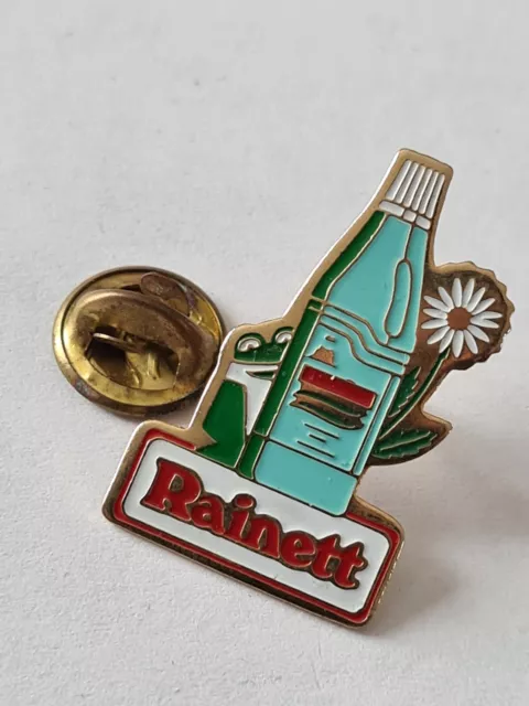 (B10) Pin's vintage épinglette collector publicitaire RAINETT