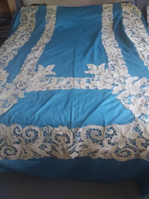 Antique Venetian hand made bobbin lace ,appliqued on blue bed spread throw cover