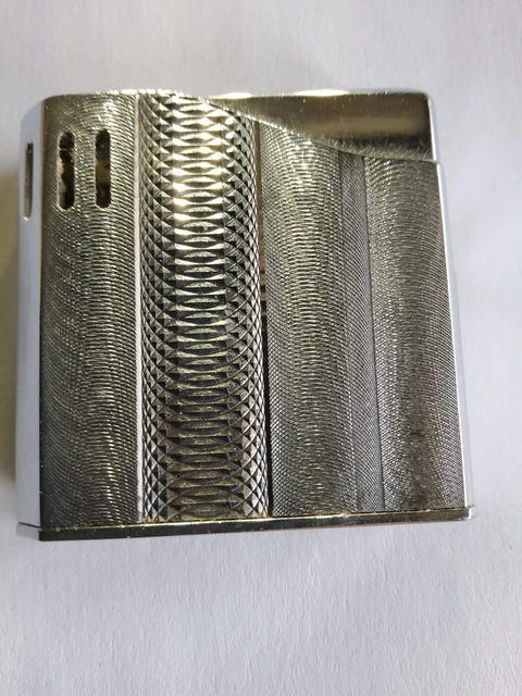 Ancien briquet Dunhill en métal argenté