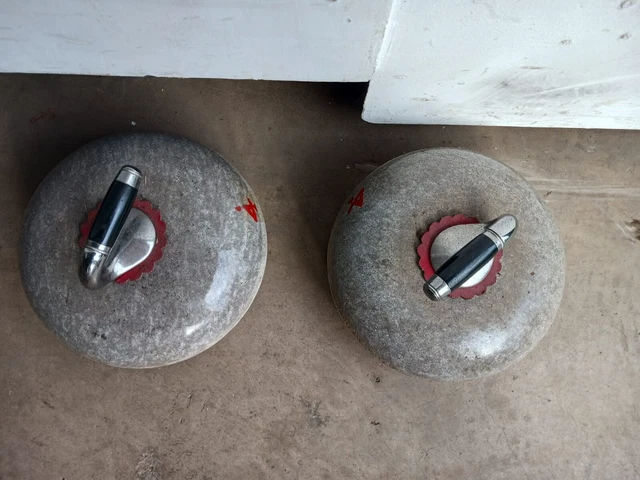 A pair of polished Scottish granite curling stones