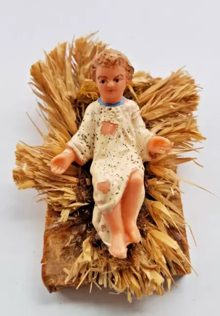 Ancien santon Petit Jésus en plastique Socle en bois et vraie paille Crèche