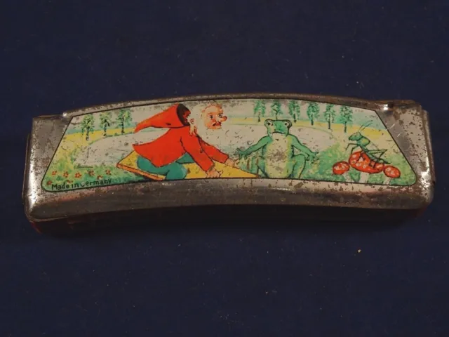Ancien jouet musical tôle bois Harmonica nain grenouille sauterelle Germany 1930