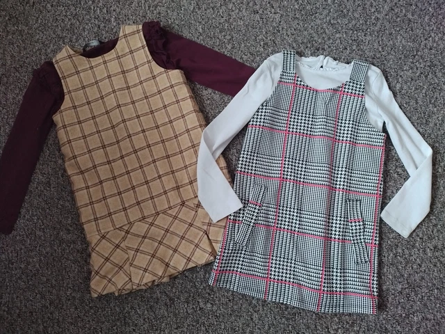 Pacchetto abiti da ragazza top Next/George e abiti a quadretti Primark/senza marchio 4-5 anni