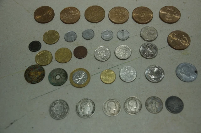 un lot de pièces francaises avant euro et pièces suisses en argent