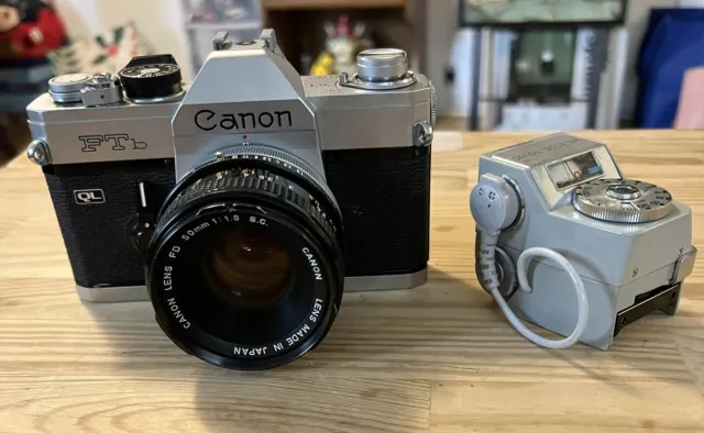 Canon FTb QL 35mm SLR Film Camera w/ 50mm  FD 1 : 1.8 S.C. Lens And Booster.