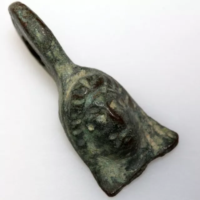 Ancient Roman bronze fragment pendant depicting a goddess face-circa 100-400 AD