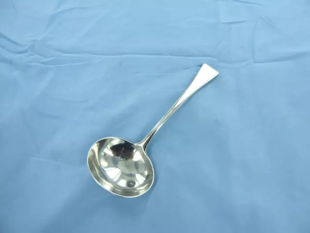 An Antique Sterling Silver, Old English Sauce Ladle, London 1817.