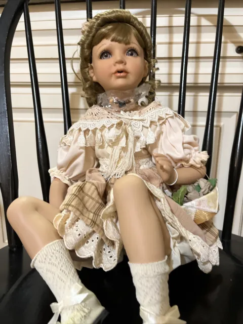 show stoppers porcelain  16” Sitting doll 197/2500 sc9r