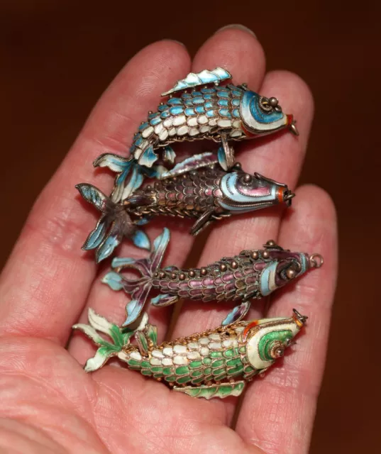 Antique Chinese silver cloisonne articulated fish pendants, 19th century. QING.