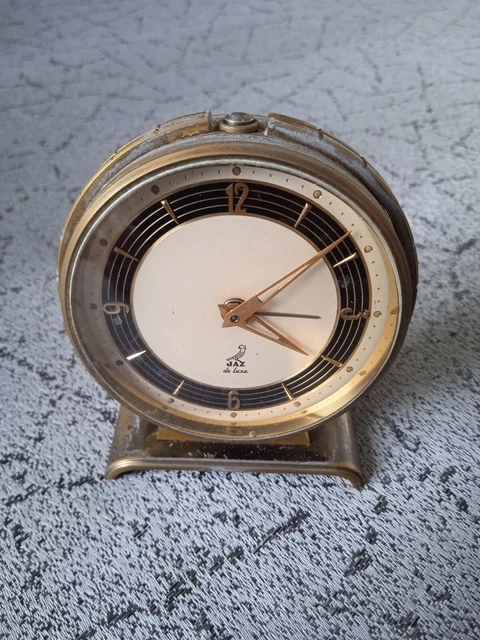 ANCIEN RÉVEIL MÉCANIQUE de voyage JAZ POUDRIC boîtier marron années 60