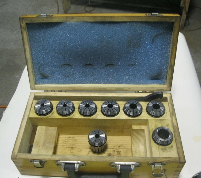 SET of ER40 COLLETS w/wrench.   Misc sizes as listed.  8 total.