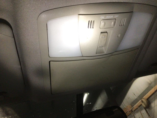Used Front Upper Center Console fits: 2009 Nissan Rogue roof w/navigation system