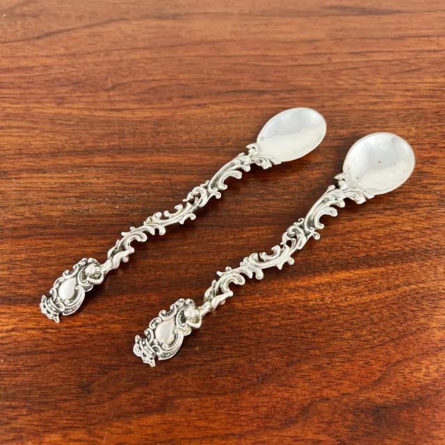 2 French Rococo 800 Silver Chocolate Spoons Cherubs Holding Shields 18Thc