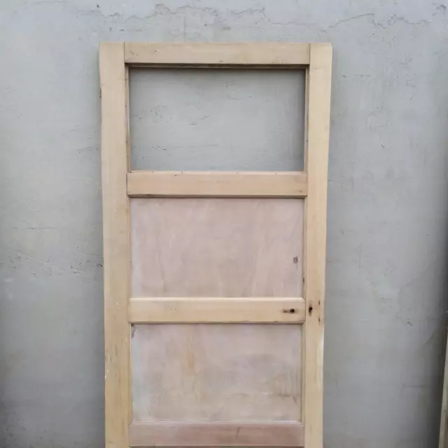 31 1/2“x57” Reclaimed 3 Panel Stripped Pine Ex Glazed Cupboard Door