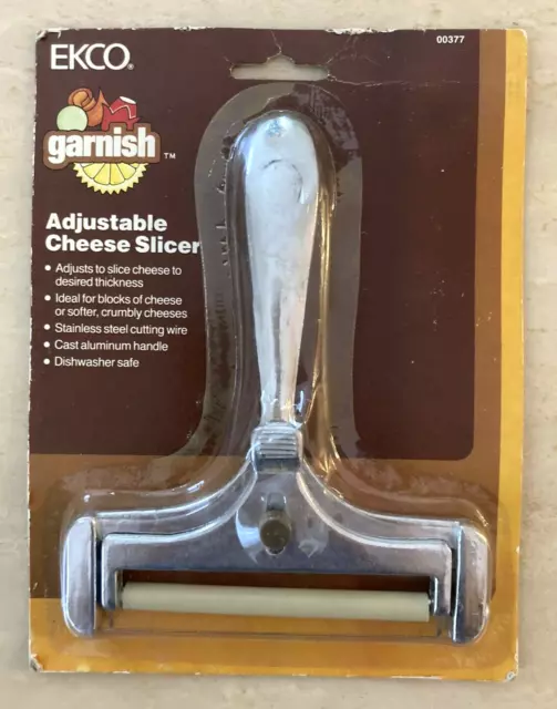 https://www.picclickimg.com/3NsAAOSw5R5k0BL1/VINTAGE-Ekco-Adjustable-Cheese-Slicer-00377-NEW.webp