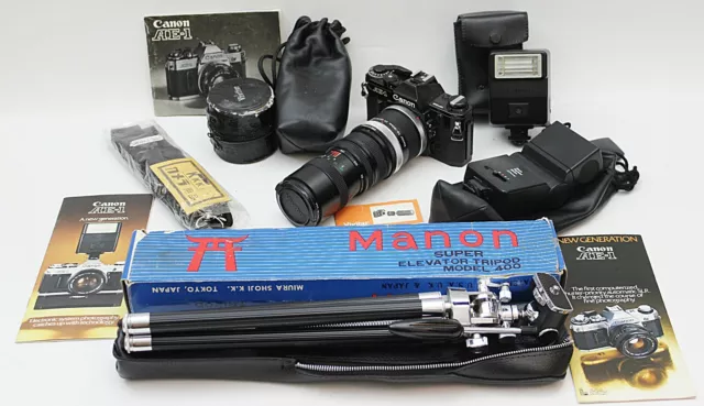 Paquete de cuerpo negro CANON AE-1, flash, lente y 2x Dup, correa, trípod + lotes de extras