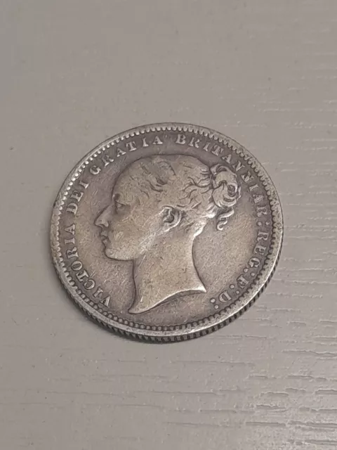 1874 Victoria One Shilling Silver Coin.  F/14