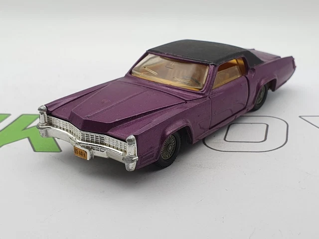 Dinky Toys 131. CADILLAC ELDORADO TOURER. PINK. MILD PLAY WEAR TO MODEL & BOX