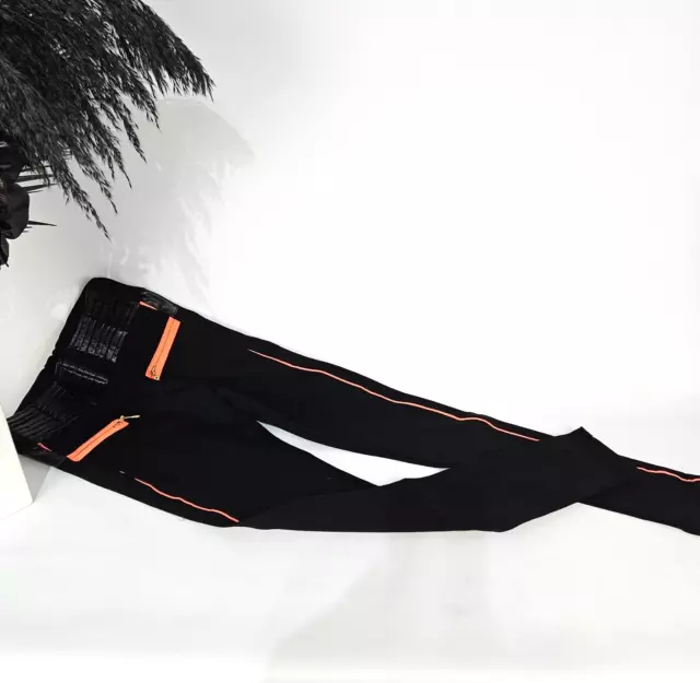 Damen Leggings mit Lederimitations Borte Stretch Hose Schwarz / Orange Größe XS