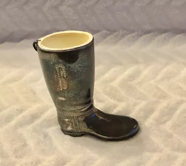 A vintage small  silver plated boot vase, very cute