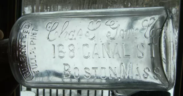 Chas. S. Gove Co., 168 Canal St., Boston, Mass.  1/2 Pint whiskey bottle(empty)