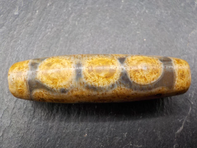 An Agate Dzi bead with a 5 Eye pattern from Tibet / Nepal.