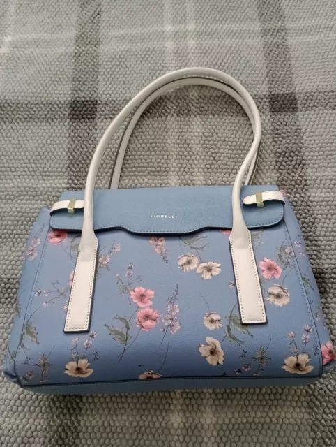 Fiorelli Powder Blue Handbag with floral pattern and cream straps