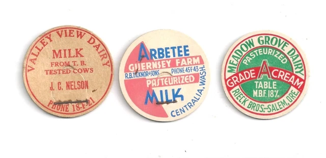 three different milk bottle caps
