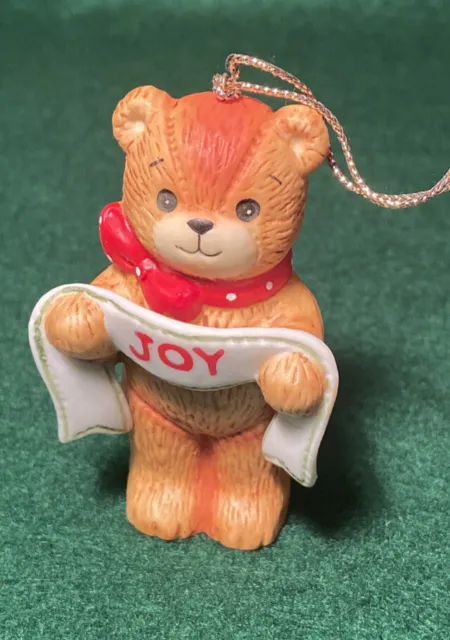 Enesco Lucy and Me Lucy Rigg red bow bear with JOY banner Christmas ornament