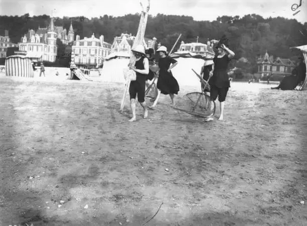 Seaside party, fishing nets & umbrellas, prepare day beach 1900 Old Photo