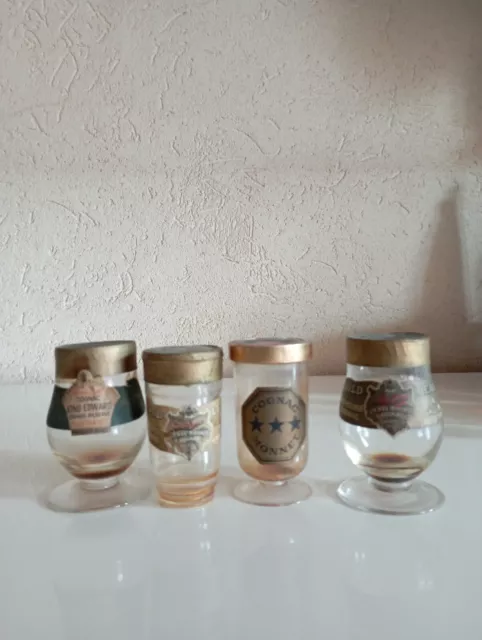 4 old mini bottles cognac Mounié(empty)