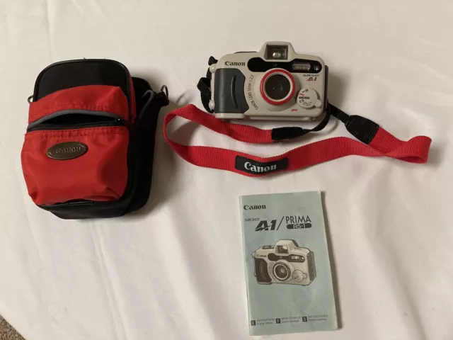 Canon Sure Shot A-1 Waterproof 35mm Film Camera With Case,Neck Strap, And Manual