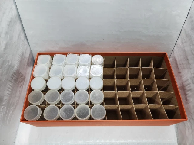 25 Quarter Square And Round Storage Tubes With Orange Storage Box