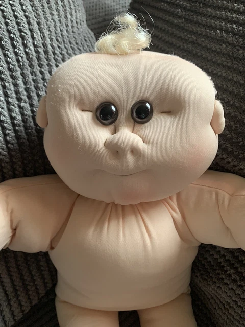 Bambola bambino scultura morbida in tessuto