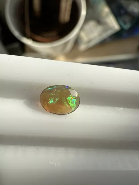 WELO OPAL Faceted, Play Of Colour. Ethiopian Opal. Natural Loose Oval Cut